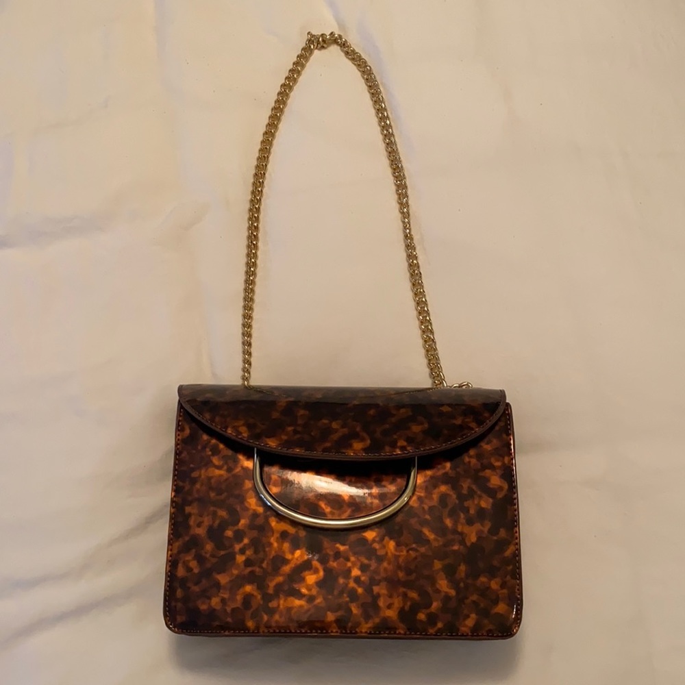 Tortoise chain shoulder purse